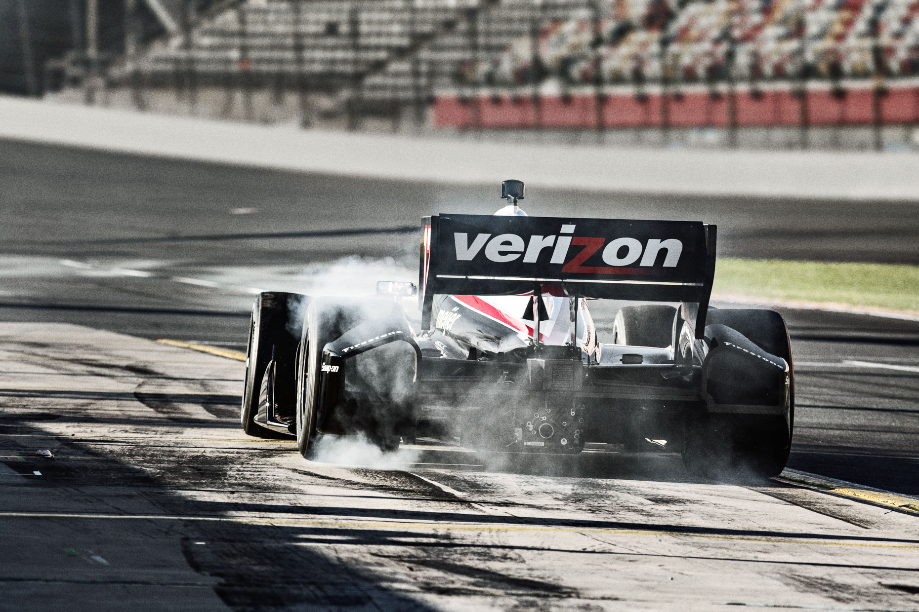 Racecar driver Will Power burns rubber IndyCar Team Penske Charlotte Motor Speedway