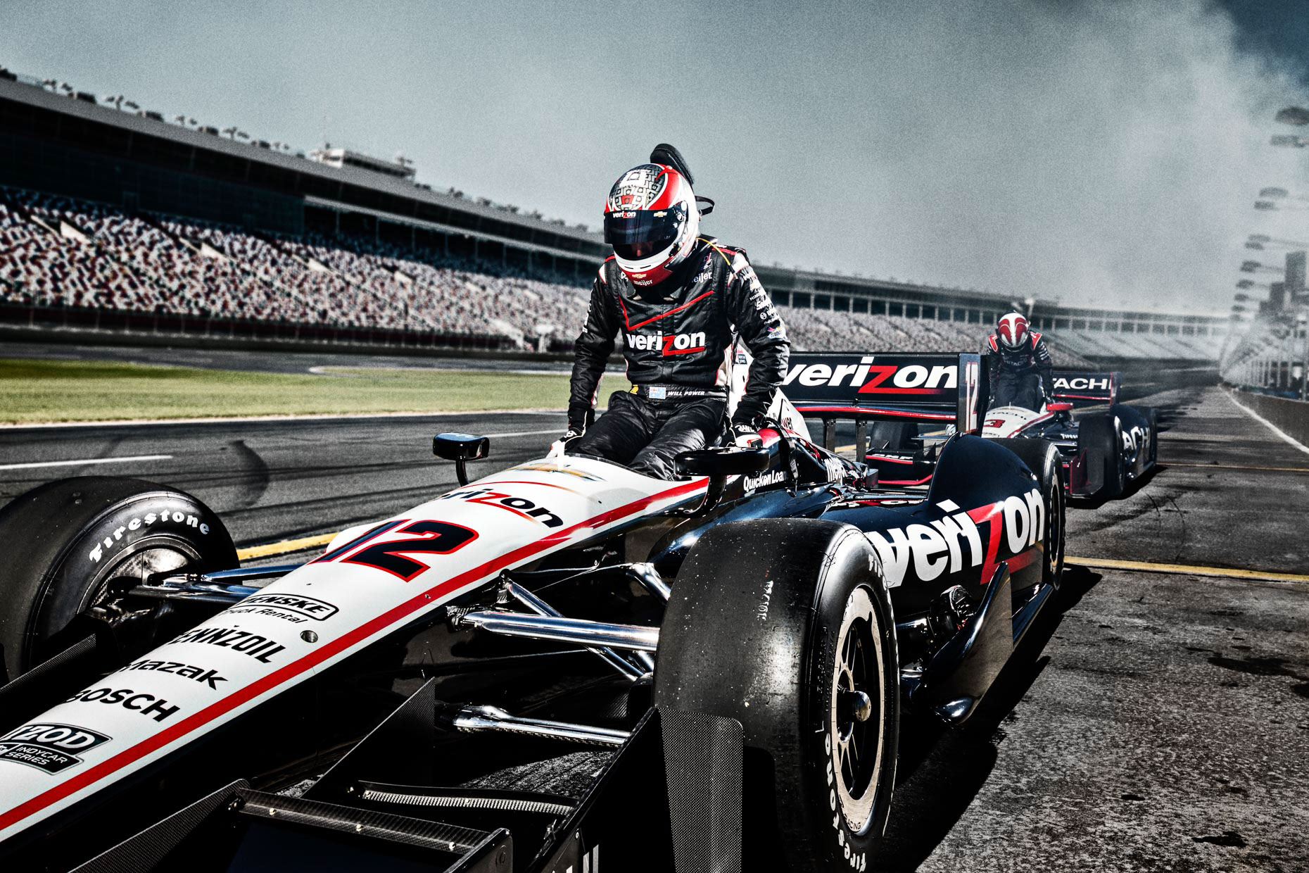 Racecar driver Will Power exits car #12 at pitstop IndyCar Team Penske Charlotte Motor Speedway by Andy Batt