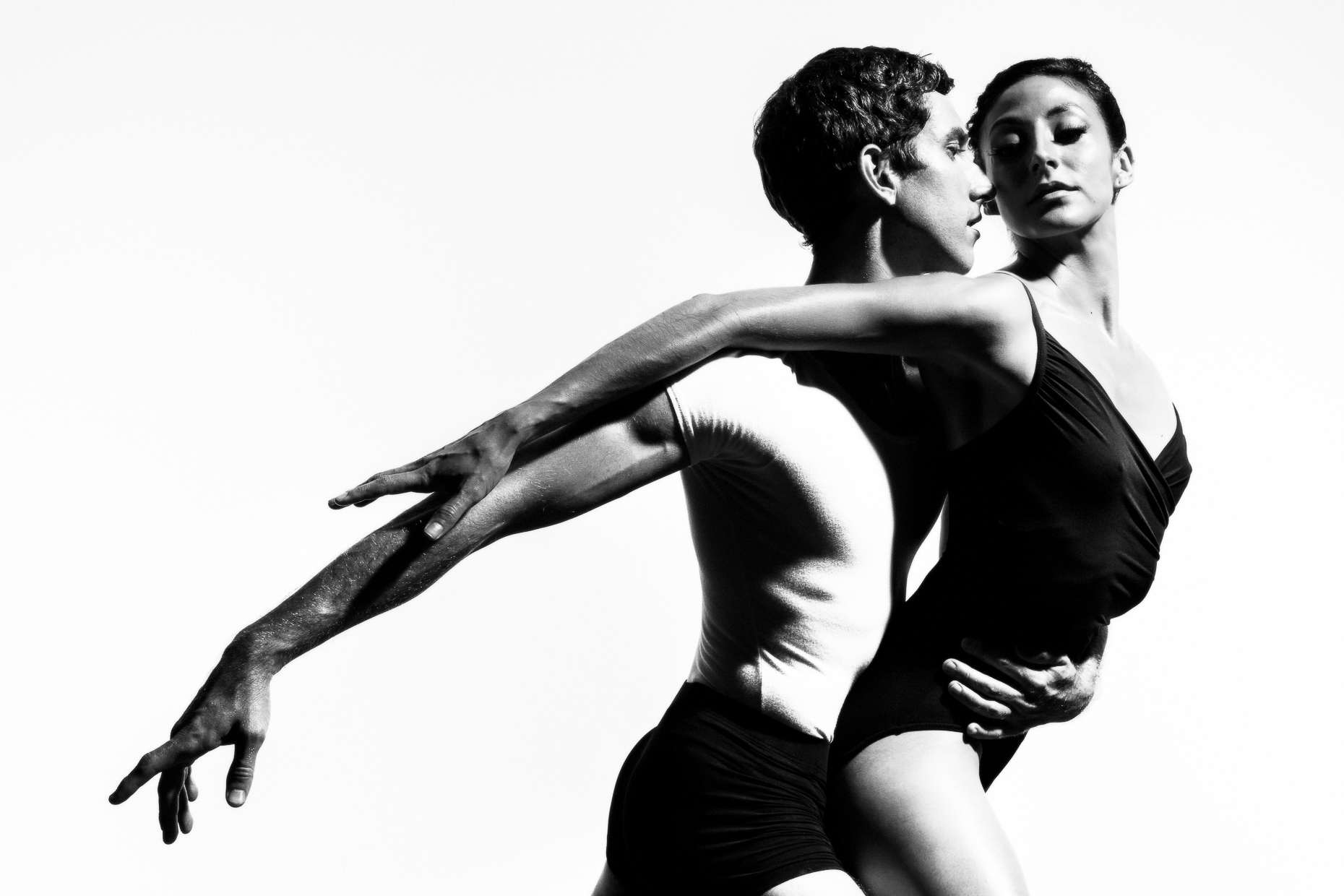 Oregon Ballet Theatre Silver Anniversary dancers Brian Simcoe and Martina Chavez by Andy Batt. Brian holds Martina tightly and gracefully.