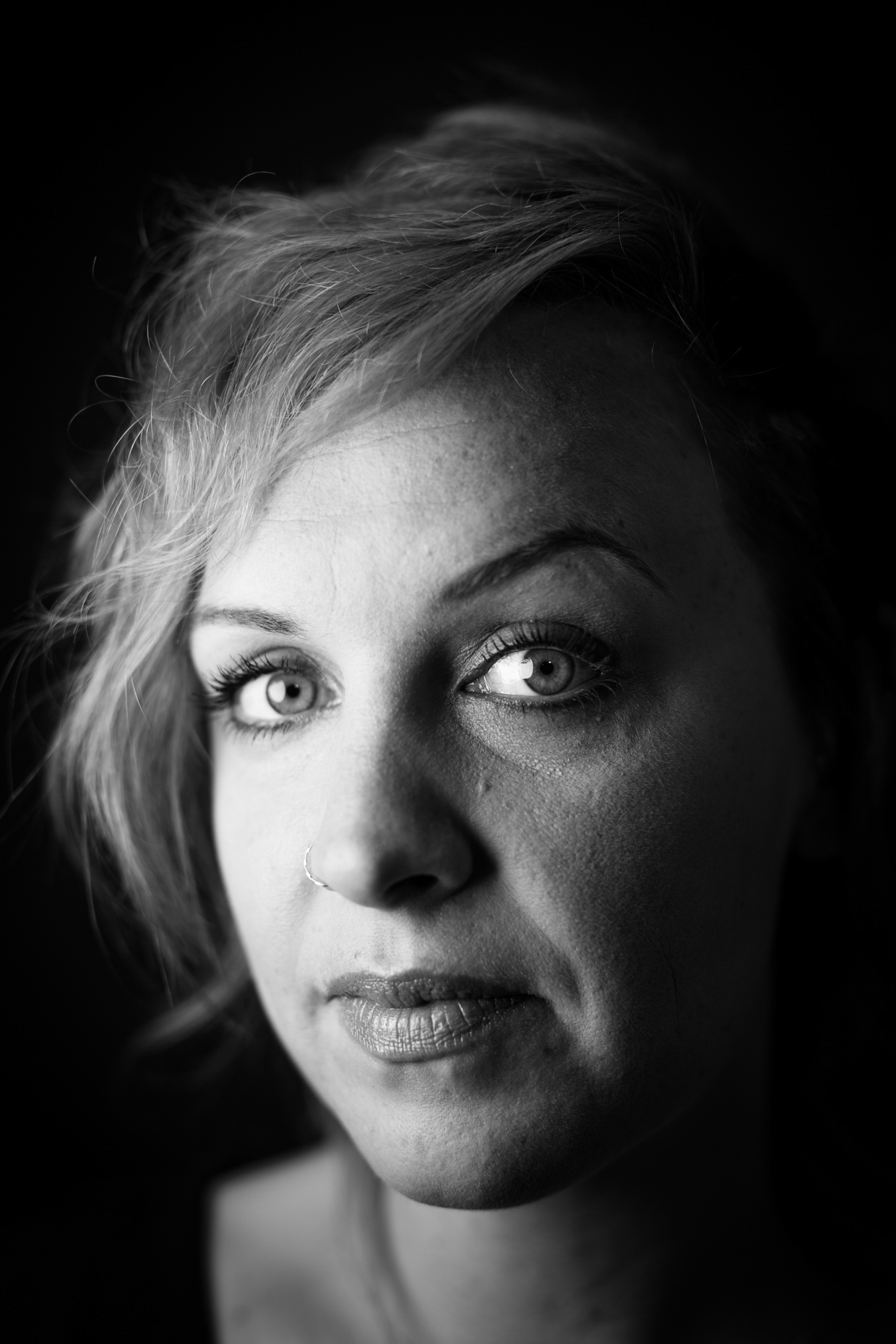 Tight B&W editorial portrait of Eva Lohse makeup stylist by Andy Batt