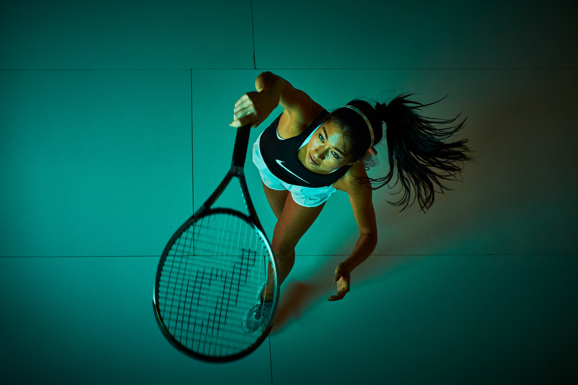 Nike Tennis serve Jenny Meeker shot from above with colorful blue gels by Andy Batt 