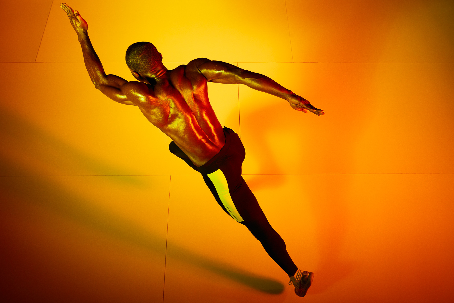 Nike Running with David Kojo Aidoo shot from above with colorful orange and yellow gels by Andy Batt