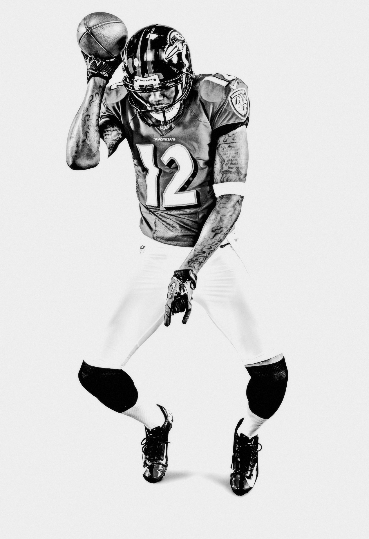 NFL Verizon Jacoby Jones celebration dance Baltimore Ravens football in a white studio b&w by Andy Batt